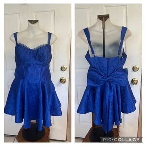 Size 8 Mxodi Royal Blue Satin Applique Sweetheart bodice sleeveless Mini Dress.